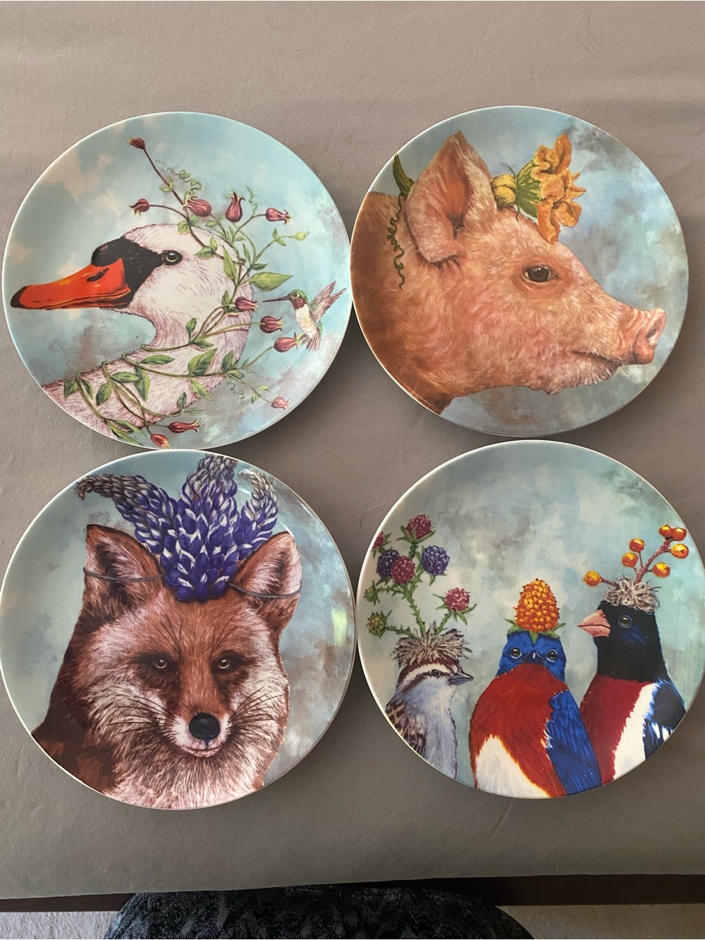 Set of 4, 7 inch, Bine China Plates with Whimsical Wildlife. Art by Vicki Sawyer